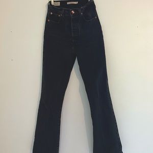 Adorable Levis Ribcage Boot 24’s with custom rainbow button